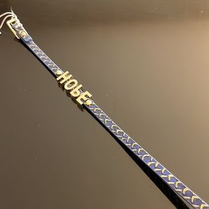Wrist strap/bracelet with HOPE letters